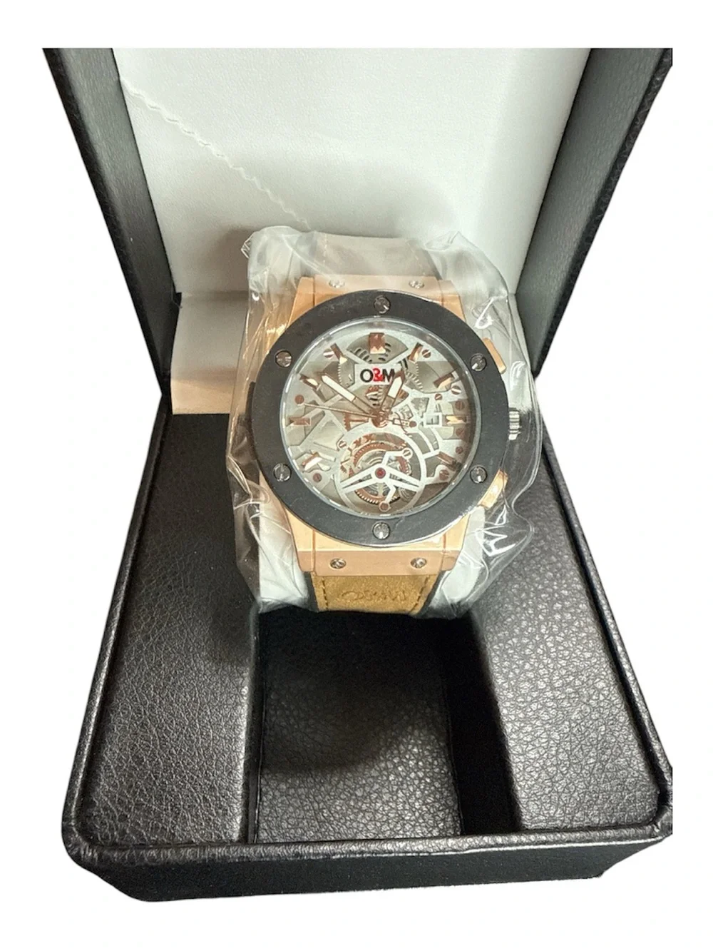 Skeleton Dial Men’s Watch in Rose Gold with Black Bezel and Tan Strap